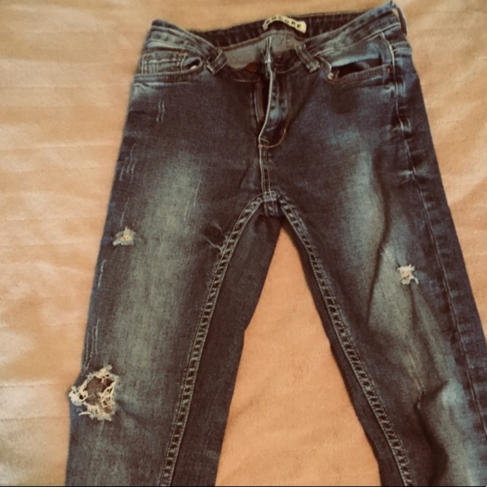 Dark blue ripped skinny jeans